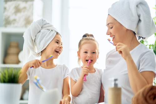 Teach your children good brushing habits to get sugar out of hard to reach places